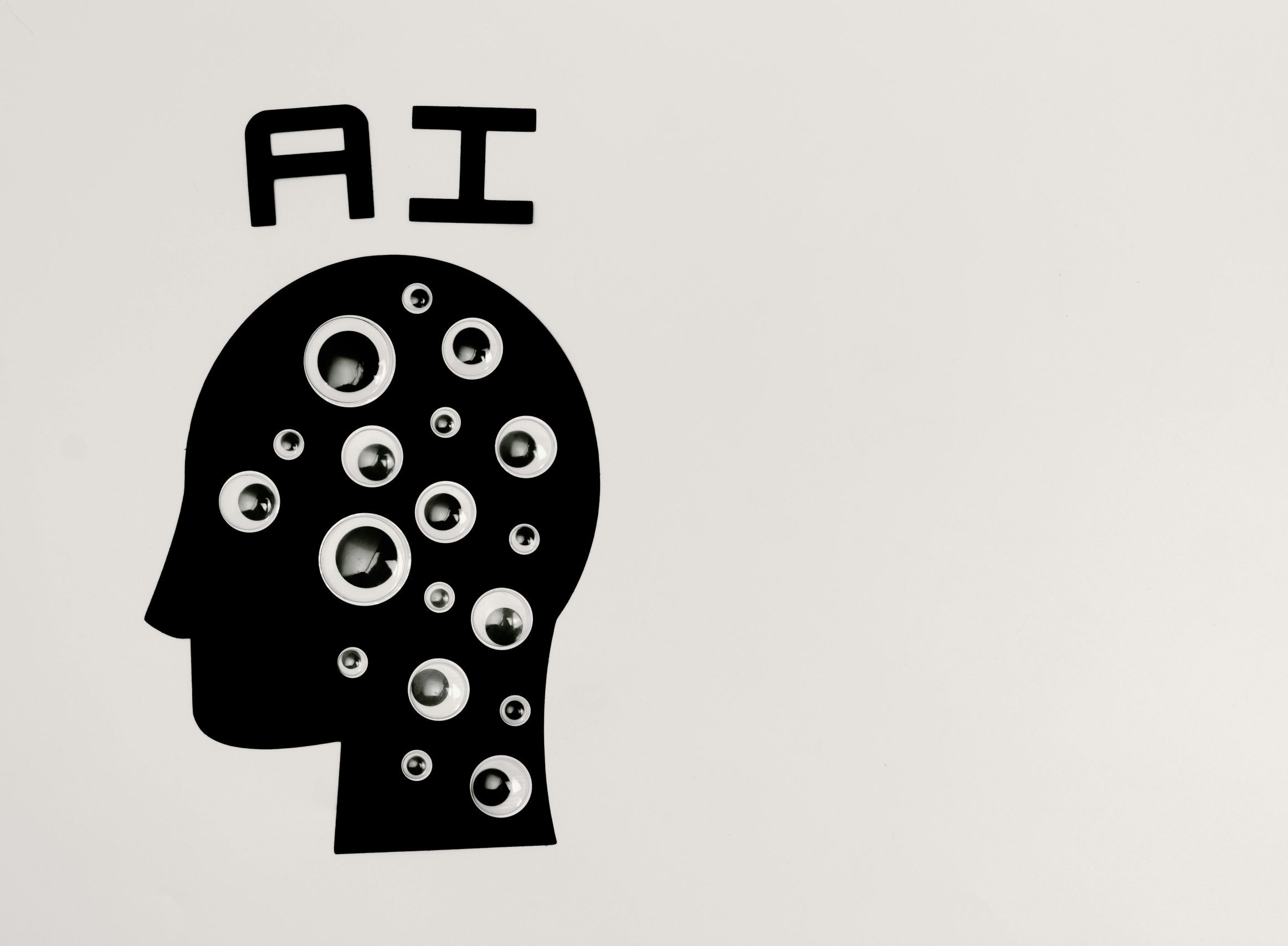 Abstract illustration of AI with silhouette head full of eyes, symbolizing observation and technology.